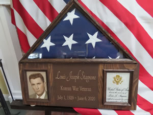 Uncle Louis military certificates at cousin Beth and Gordy’s reception in Amesbury, Massachusetts.