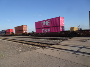 Triple train tracks near highway to Elm Creek, Nebraska.