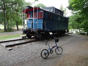Caboose at North end of the Windham rails to trails in New Hampshire.