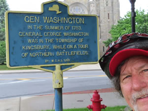 Ted with sign in Hudson Falls, New York.