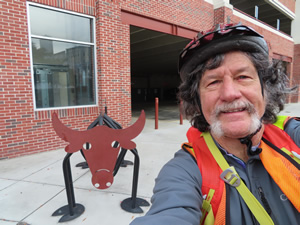 Ted near a bike rack in Durham historic area.
