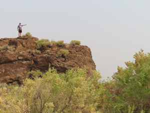 Ted on rock at Buena Vista pond overlook in Malheur wildlife refuge.