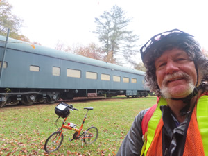 Ted with his bike next to the Swamp Rabbit Trail.