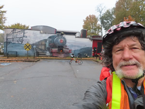 Ted with his bike next to the Swamp Rabbit Trail.