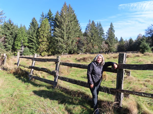 Marty leaning on fence at Kestner Homestead.