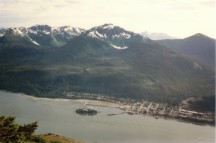 A view from the top of Mount Roberts with the bridge that goes from Douglas to Juneau. This bridge is over part of the Alaska Inside Passage.