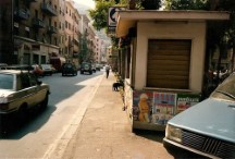 The streets of Genova, notice the poster with the nude lady on the building.