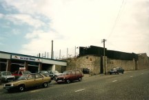 A fortified (gun ports, TV cameras and barbed wire) building near the Northern Ireland boarder. It might be a military building.