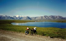 Ted's bike with lake and Brooks Range in background.