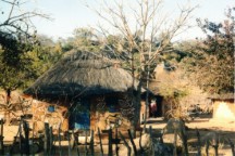 Fancy painted grass huts near Mashavuka caves, across the canyon from the secondary school on Kumalo community land.