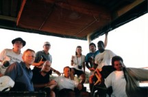 Zambezi riverboat ride up stream of Victoria Falls.  Left to right  Heather, Karen, John, Ezra, Gary, Becky, Shingi and a boat guide.