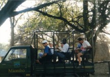 Our group in a game viewing truck as we are about to enter Hwange National Park.  Front row - John and Karen.  Middle row - Shingi and Becky.  Back seats - Gary and Ezra.