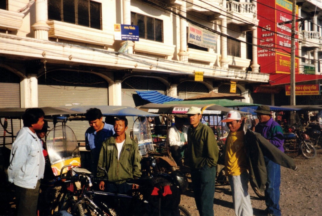 The drivers of the 3 wheeled motorcycles (Samlor Kruengs) that were checking out my bike in Chiang Khong, Thailand.