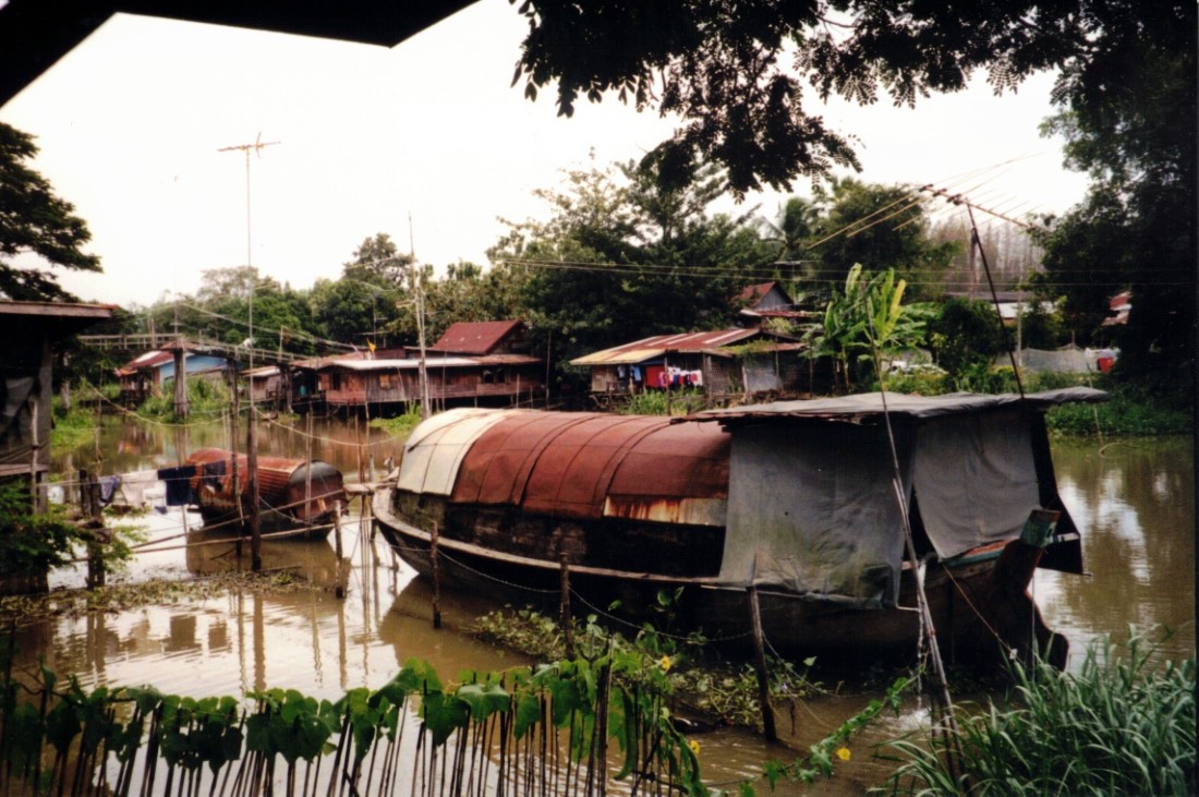 A houseboat on a river a little north of Bangkok, Thailand.