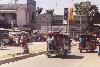 People in 3 wheeled taxis (Tuk-tuk) in Ayuthaya, Thailand.