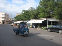 Three wheel vehicle - common in Italy - They sounds like a motorcycle.