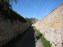 Town east of Palermo - Ted's bike on narrow road, not sure what would have happened if cars would have been coming in both directions.