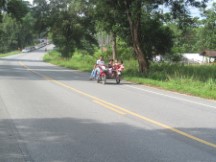 Typical 3 wheeled motor scooter transportation in Thailand