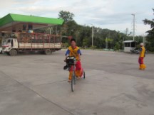 Kid riding Ted’s bike in Thailand