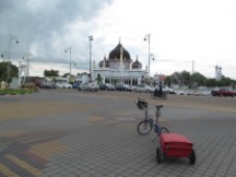 Ted’s bike in front of a Mosque in Alor Star, Malaysia