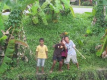 Kids near where Ted took off his rain gear in Malaysia