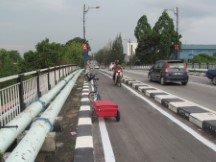 Motor scooter lane south of Muar, Malaysia