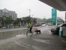 Man on Ted’s bike while waiting for Manson at gas station near Johor Bahru, Malaysia