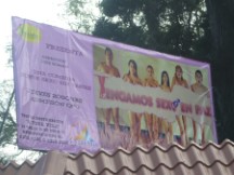 Advertisement sign in Guatemala City, since I do not understand Spanish I am not sure what they are advertising.
