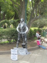 Statue man in Antigua, Guatemala.Real guy making a living.