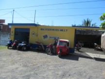 Motor cycle repair shop in Guatemala.