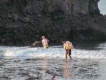 Men fishing near beach town near El Zunzai, El Salvador