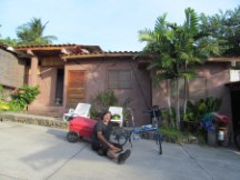 Ted in front of the motel room where he stayed near El Zunzai, El Salvador