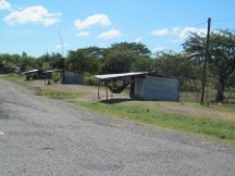 Homes with people sleeping in hammock in Nicaragua