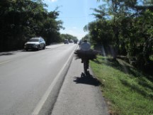 Man carrying wood on his bike in Nicaragua.