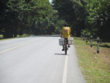 Bike carrying 5 gallon buckets of water in Nicaragua
