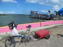 Ted’s bike with boat he took from Ometepe Island, Nicaragua in background.
