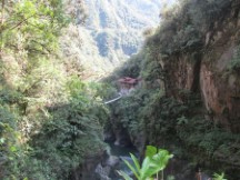 Lodge with catwalk near Pailon Del Diablo waterfall.