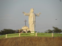 A statue on the hill overlooking the waterfront in the town of Pacasmayo, Peru.