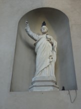 Statue in front of the church on main square of Paysandu, Uruguay.