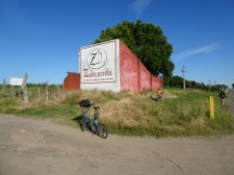 Ted’s bike in front of winnery building in Uruguay.