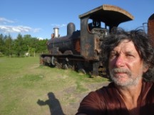 Ted in front of historic train in park, probably in San Jose, Uruguay.
