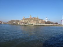 Ellis Island seen from boat near New York City.