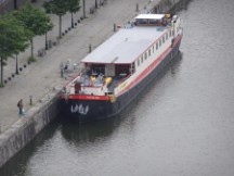 Belgium – Our barge the Angelina as seen with the zoom lens of my camera from the top of the MAS (Museum Ann De Stroom).