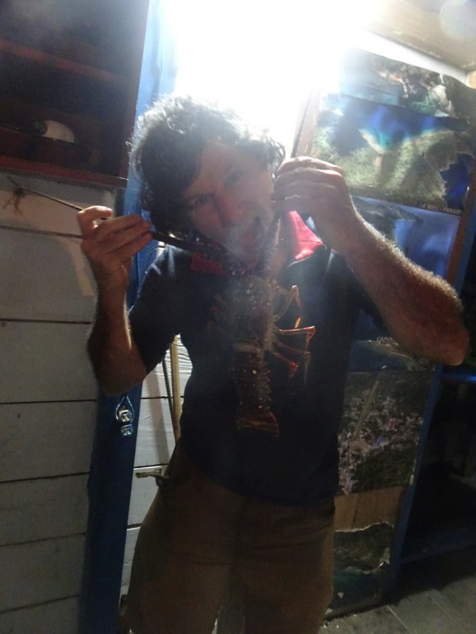 Ted with a Lobster we ate in Capurgana, Colombia.