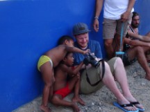 Village Ted visited on his second night in the San Blas Islands, Panama. – Matt showing the Kuna children photos he had just taken.