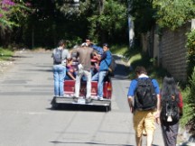 Truck loaded with people (very common) in the back at Lake Atitlan in Guatemala.