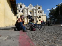 Ted with his bike in front of La Merced church in Antigua, Guatemala.