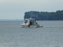 Boat in harbor of Livingston, Guatemala.