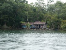 Home on the shore of the Rio Dulce between the town of Rio Dulce and Livingston, Guatemala.