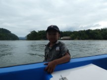 Child coming to our boat to sell us stuff on the Rio Dulce between the town of Rio Dulce and Livingston, Guatemala.